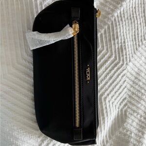 Tumi Meera slim waist pack with Gold Accents